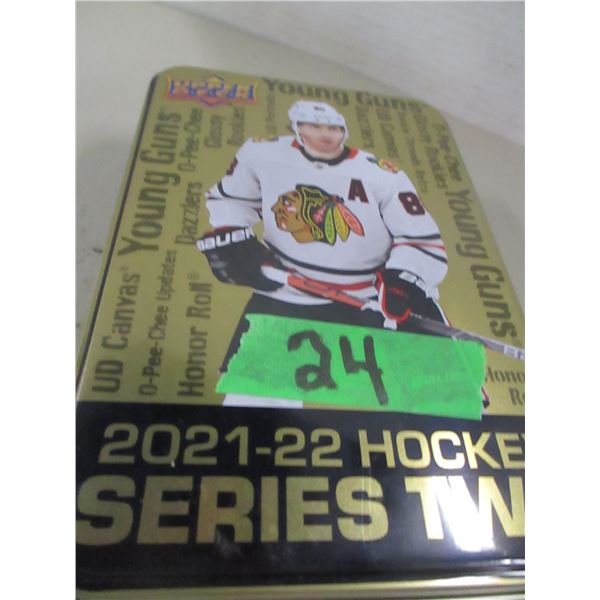 TIN C/W APPROX. 100 YOUNG GUNS NHL CARDS