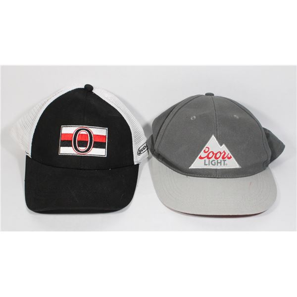 TWO BASEBALL CAPS INCLUDING COORS LIGHT AND