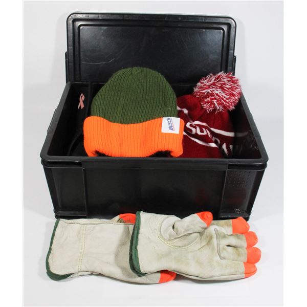SMALL BLACK TOTE FULL OF WINTER HATS AND WORK