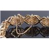 Image 2 : 14K YELLOW GOLD "X" STYLE GOLD & DIAMOND BRACELET