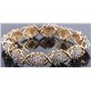 Image 4 : 14K YELLOW GOLD "X" STYLE GOLD & DIAMOND BRACELET