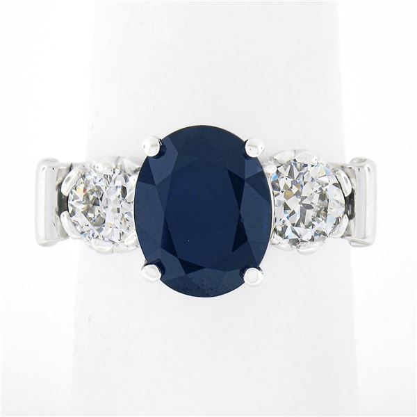 Vintage Platinum 4.95 ctw GIA Oval Dark Blue Sapphire w/ Old European Diamond Ri