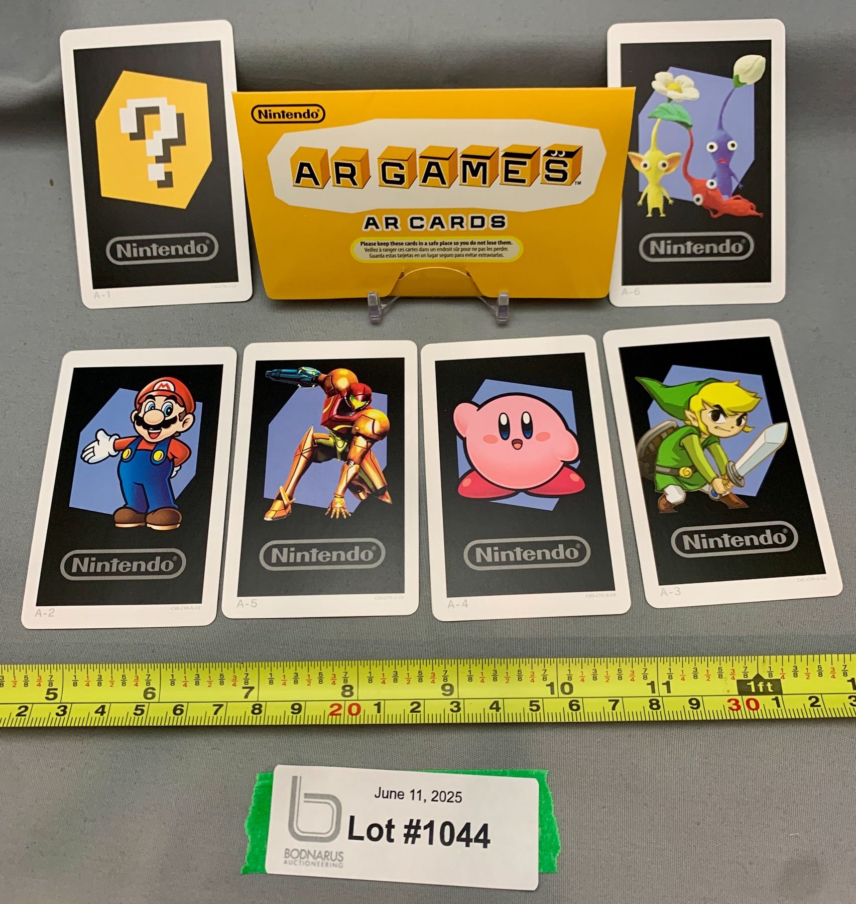 Nintendo Code Cheat Cards Set in Original Folder - Bodnarus Auctioneering