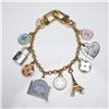 Image 1 : Louis Vuitton Gold and Enamel Bag Charm
