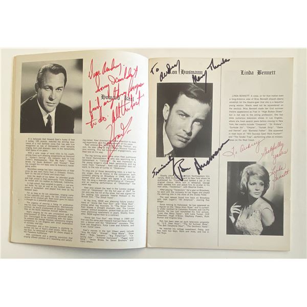 Howard Keel, Ron Husmann, and Linda Bennett signed Camelot program