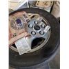 Image 2 : 4 CHEVY 5 BOLT RIMS WITH 215 60/R15 TIRES