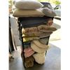 Image 2 : FOUR TIER BLACK SHELF FULL OF FLEECE BLANKETS PILLOWS