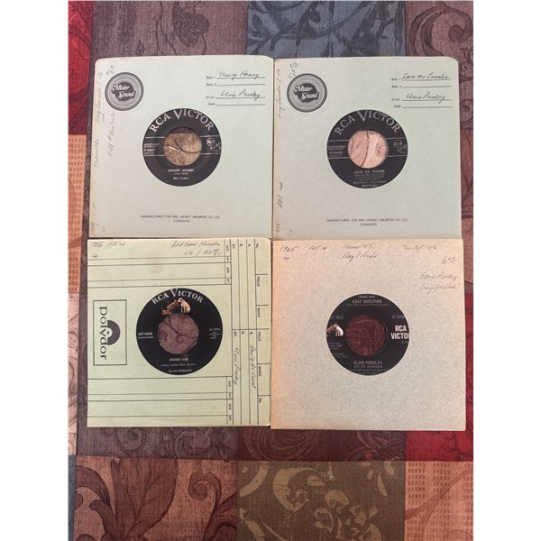 4 Elvis Presley 45’s
