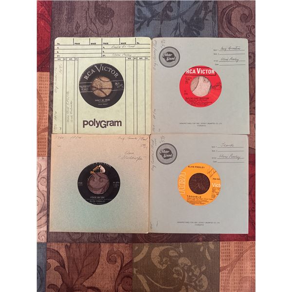 4 Elvis Presley 45’s