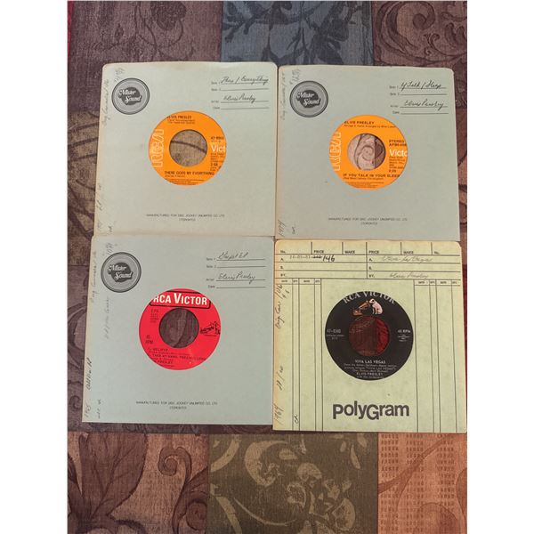 4 Elvis Presley 45’s