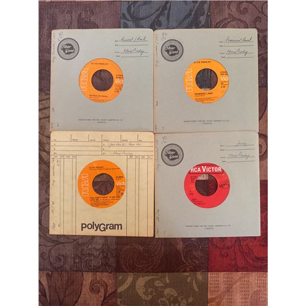 4 Elvis Presley 45’s