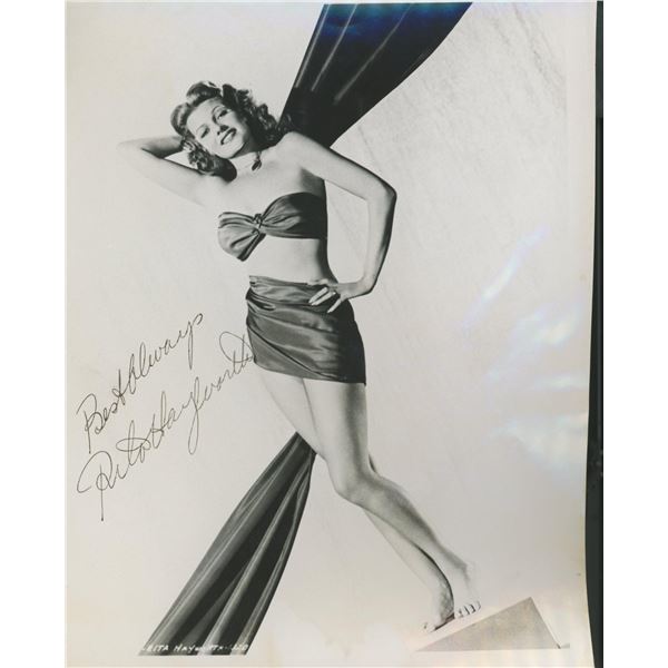 Rita Hayworth signed photo. GFA Authenticated