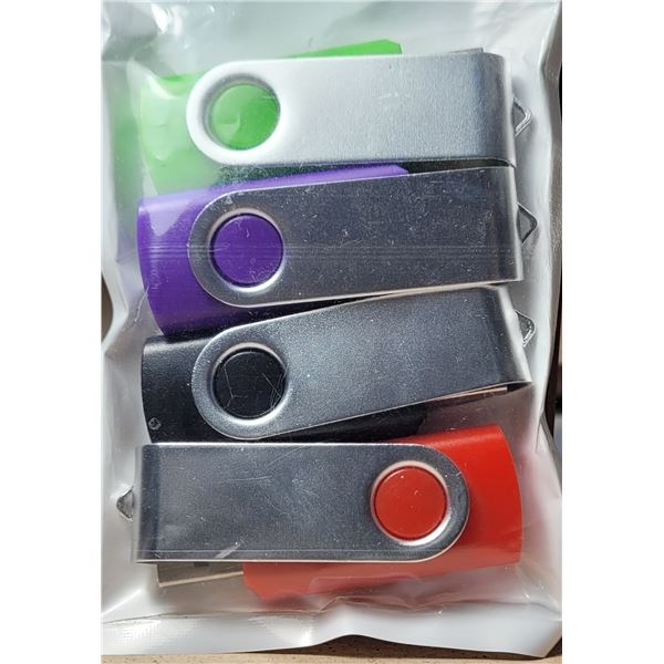 29)  LOT OF 4 NEW 16MG THUMB DRIVES.
