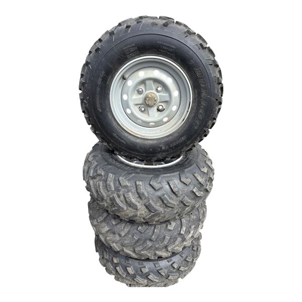 Four DUNLOP Quad Tires on Rims
