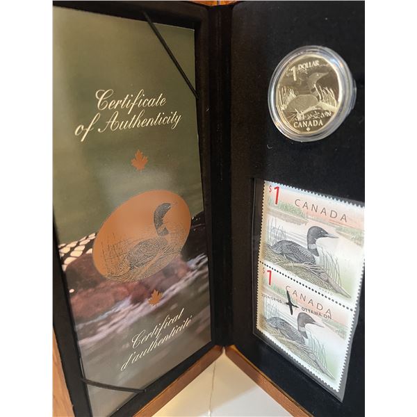 Loon 1.00 coin and stamps