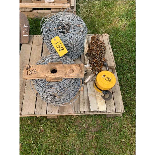2 spools of barbwire, fencing tools, chain hoist.