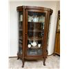 Image 1 : Oak Bow front china cabinet, triple-curved glass, paw feet (contents not included)