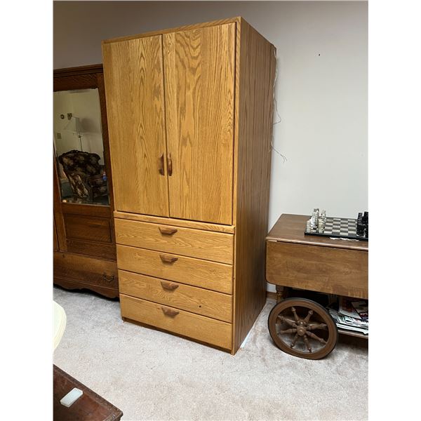 Custom made oak TV cabinet with swing-out swivel shelf and hide-away doors