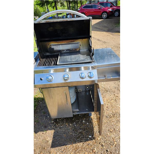 Stainless Jackson grill BBQ. C/w flat top, rotisserie  and cover