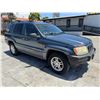 Image 2 : JEEP GD CHEROKEE 2002 SALV T/DONATION