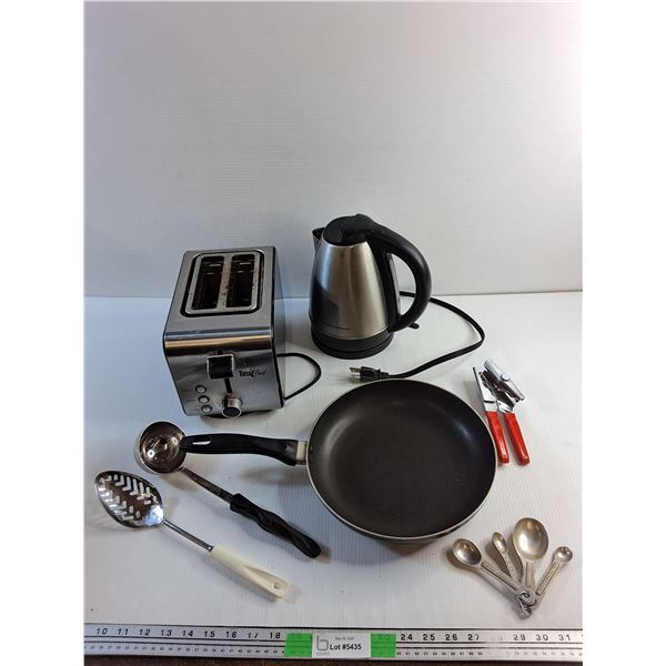 Toaster, Hamilton Beach Kettle, Ladel, Can Opener, Frying Pan, Measuring Spoons and Slater Spoon