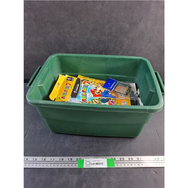 Plastic Tote and Various Game Packaging