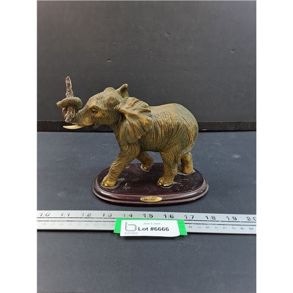 Ruby's Collection - Elephant w/Branch Figurine - 8" x 6" x 4" - One Tusk Broken