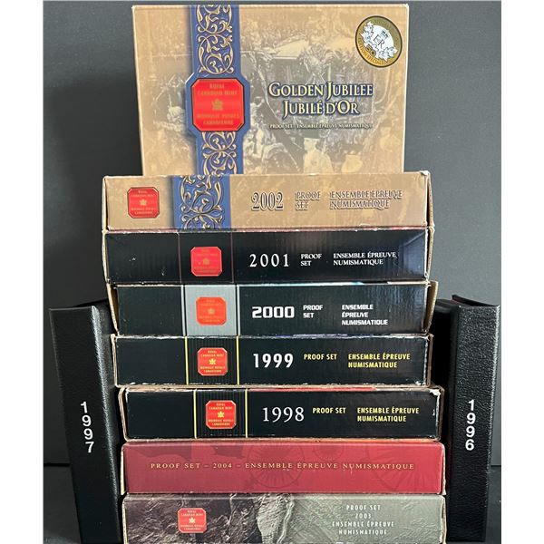 1996 Proof Sets, 1997, 1998, 1999, 2000, 2001, 2002 Reg, 2002 Sp Ed, 2003 & 2004.  Lot of 10 sets.