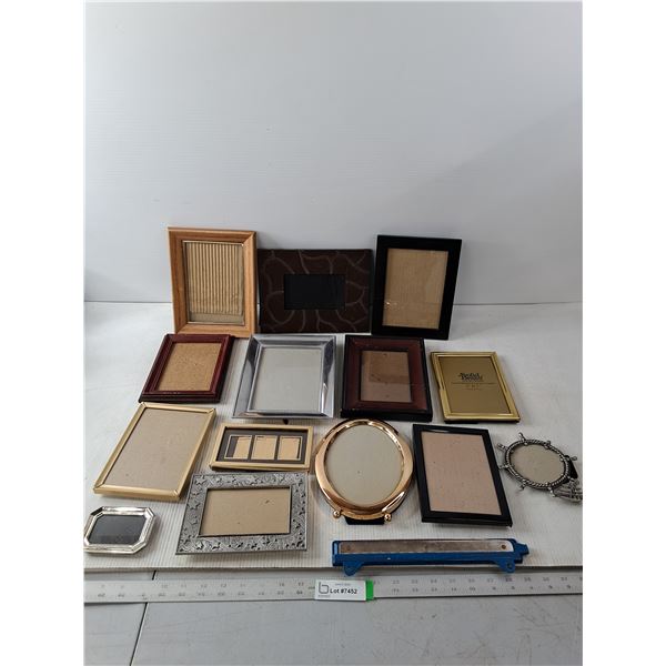 Numerous Different Sized Photo Frames