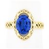 Image 1 : NEW 14k Gold 2.0 ctw Violet Blue Oval Tanzanite w/ Scroll Open Work Solitaire Ri