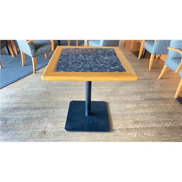 OAK AND POLISHED GRANITE TABLE  TOP ON BLACK METAL PEDESTAL APPROX 29"H X 28"L X28" W