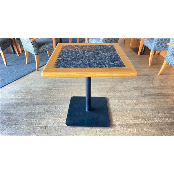 OAK AND POLISHED GRANITE TABLE  TOP ON BLACK METAL PEDESTAL APPROX 29"H X 28"L X28" W