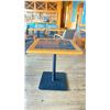 Image 2 : OAK AND POLISHED GRANITE TABLE  TOP ON BLACK METAL PEDESTAL APPROX 29"H X 28"L X28" W
