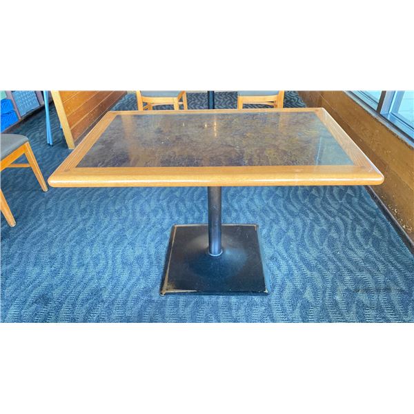OAK TABLE WITH TWO TONE TOP BLACK  METAL PEDESTAL APPROX 45" L X 28" W X 29"H