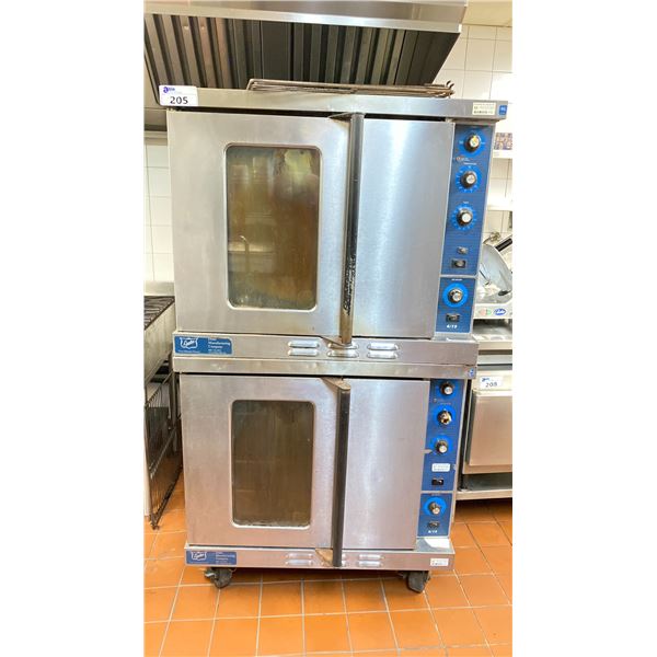 GROUP OF 2 DUKE GAS OVENS WITH METAL RACKING APPROX INSIDE COOKING 23" H X 29" W X 25" D