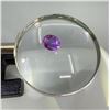 Image 1 : 9.38 Carat Oval Synthetic Purple Sapphire