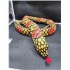 Image 1 : Aprox 3′ Plush Snakelike Toy With Black, Yellow, And Red Patterns