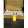 Image 1 : Set Of 24 Battery-Powered LED Flickering Tea Light Candles