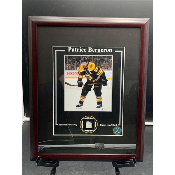 PATRICE BERGERON - NHL GAME USED STICK, COA: GREATS OF THE GAME, ITEM SIZE IS 12.5" X 15", PROFESSIO