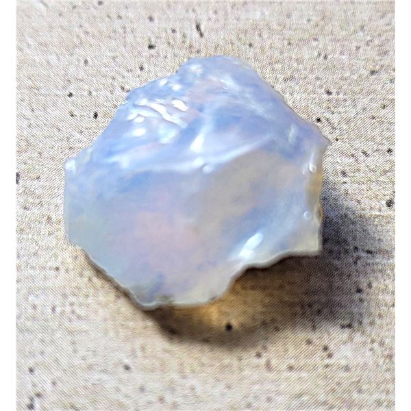 3)  NATURAL 5.5 CT ETHOPEAN ROUGH OPAL.
