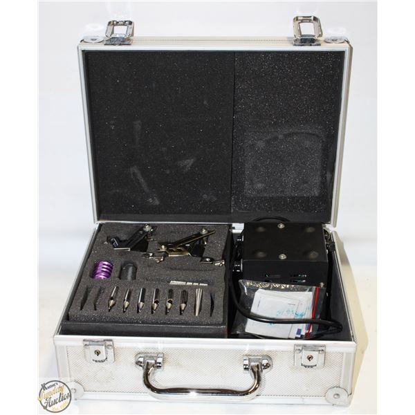 TATTOO ARTIST TOOLS IN CASE