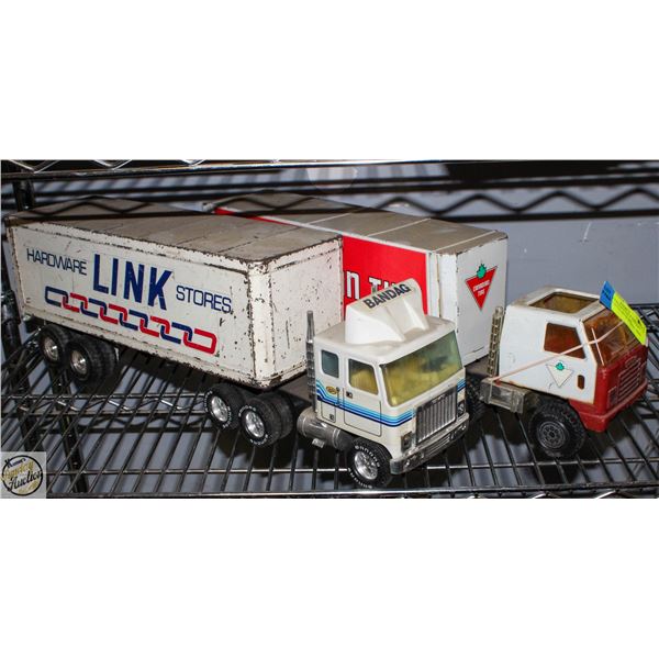 PAIR OF COLLECTABLE DIECAST TRUCKS WITH TRAILERS