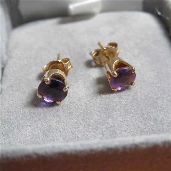 14K Yellow Gold with purple stone solitaire earrings.  Very beautiful.  14K marked on post