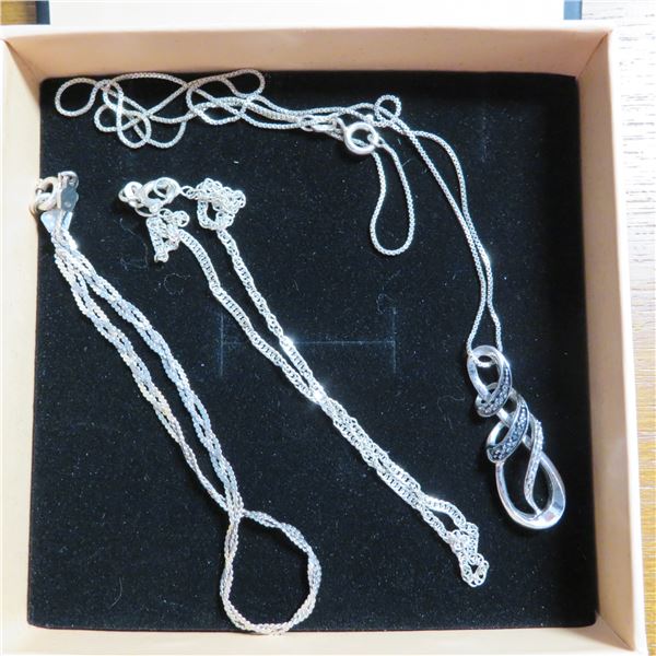 925 Silver lot.  Includes chain with pendant, bracelet & anklet.  Very nice!