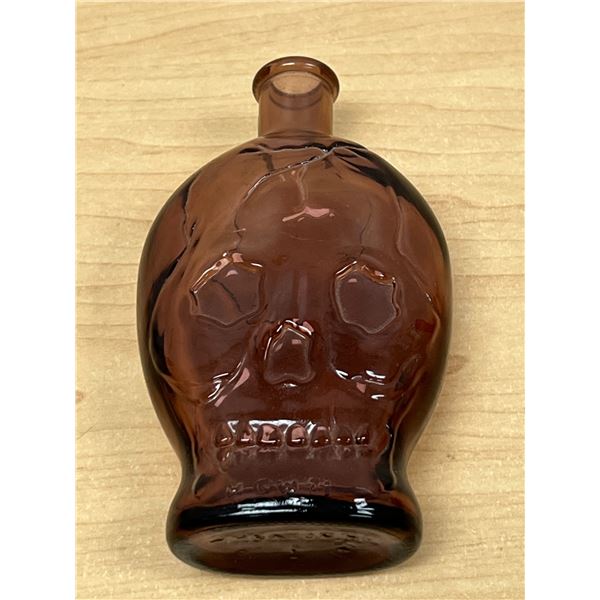 Unusual Embossed Skull Face Glass Bottle 5"