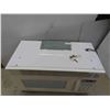 Image 2 : magic chef over the range microwave with turntable