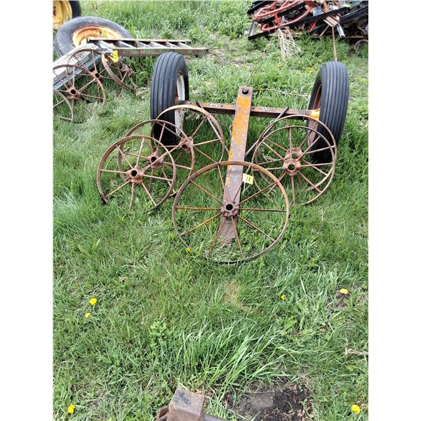 (5) 20" Antique Steel Wheels,  (1) 26" Antique Steel Wheel Dolly