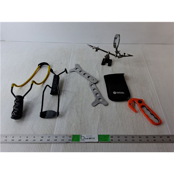 (2) Slingshots- As Is, Magnifying Glass, Safety Knife, Misc.