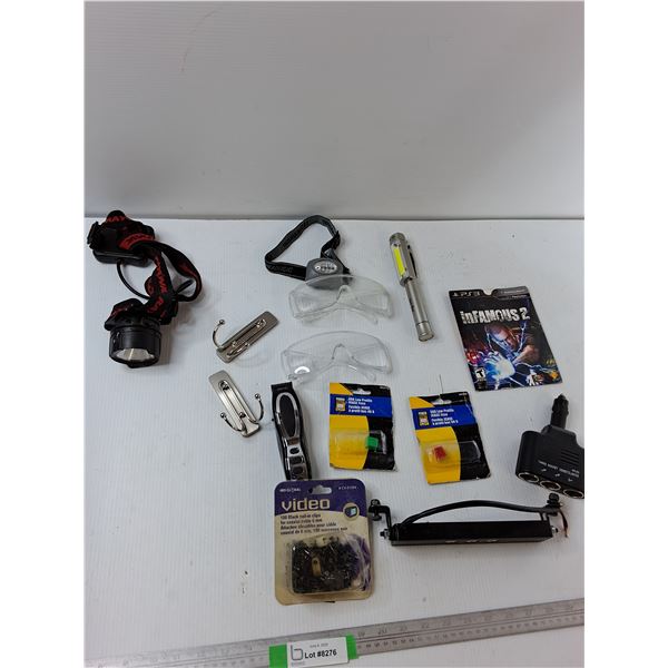 (2) Headlights, (2) Safety Goggles, (2) Fuses, Misc
