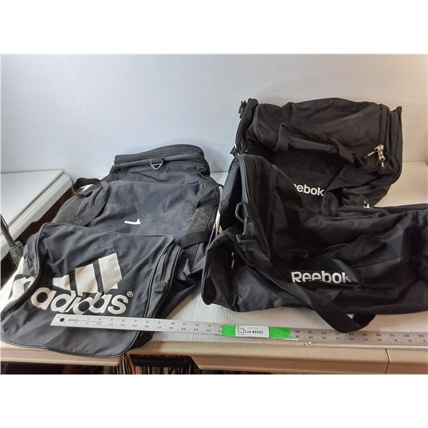 (3) Duffel Bags- Reebok, Adidas. One Ripped
